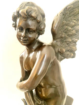 Sculpture ange Cupidon en bronze signée Moreau sur socle en marbre