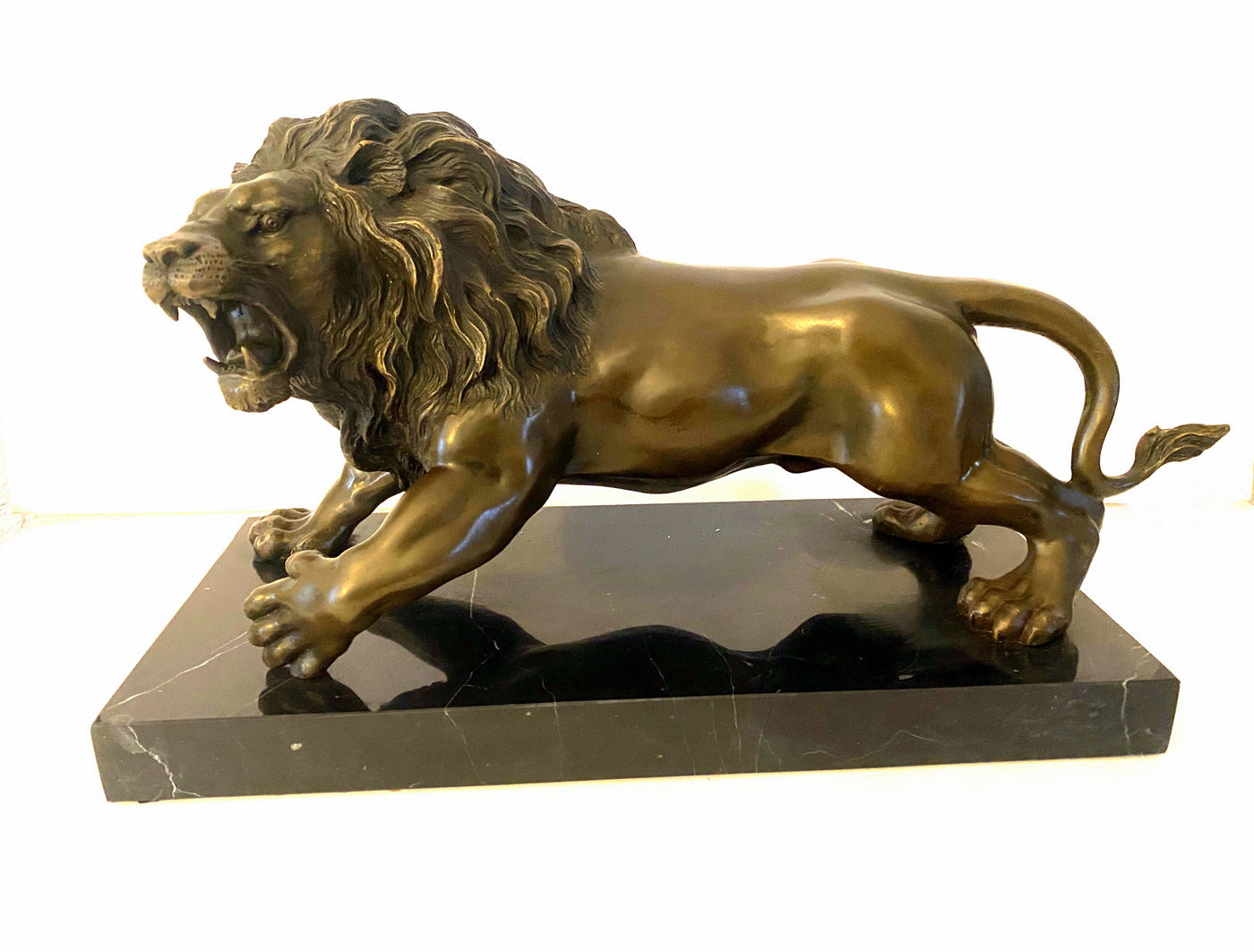 Animal bronze - lion on marble base with artist signature