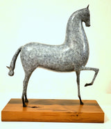 Bronze horse on wooden base in greenish-blue patina finished as a cast Elie Nadelman