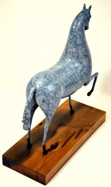 Bronze horse on wooden base in greenish-blue patina finished as a cast Elie Nadelman