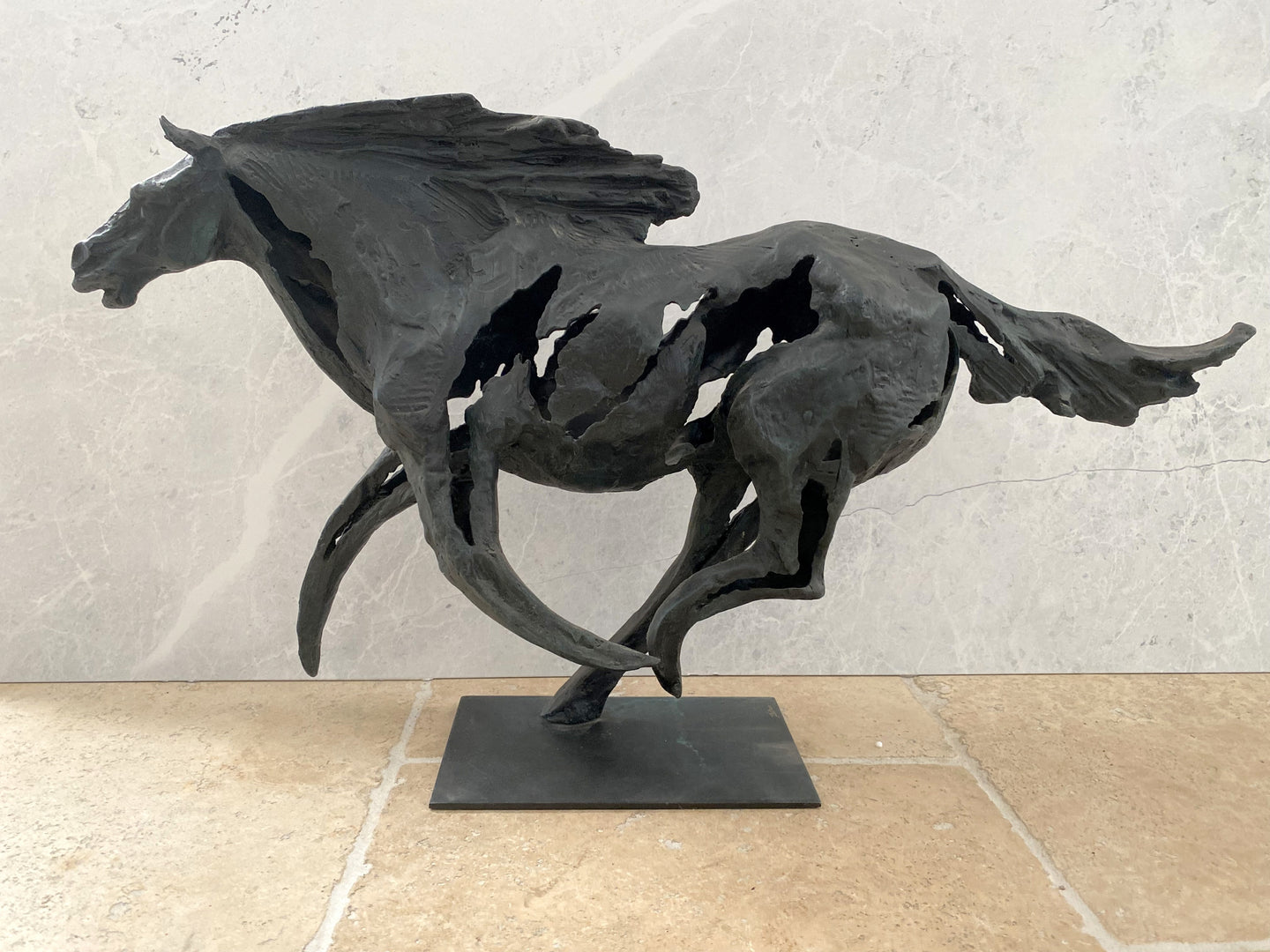 Abstract horse sculpture in bronze with artist signature