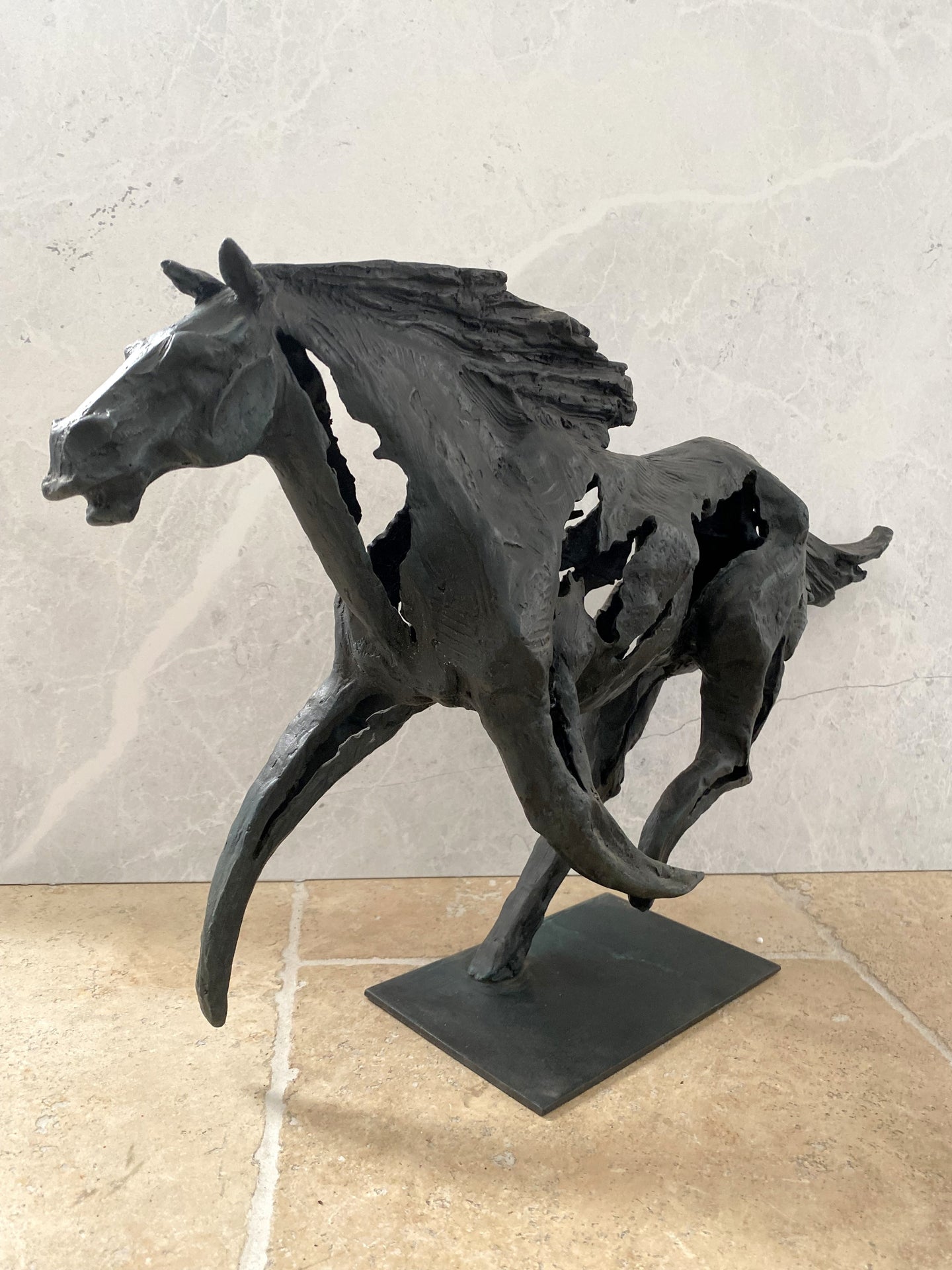 Abstract horse sculpture in bronze with artist signature