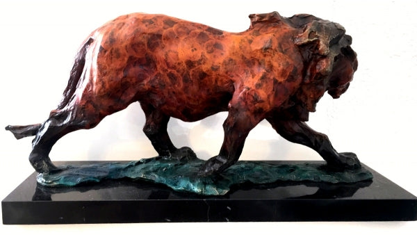 Bronze lion signed Bugatti on marble cast bronze figure