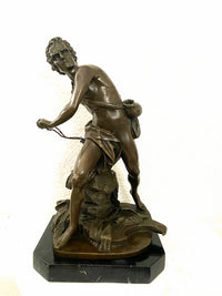 David with slingshot bronze figure on marble base signed