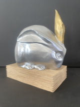 Animal figure-bronze figure-bronze rabbit on oak base with artist signature