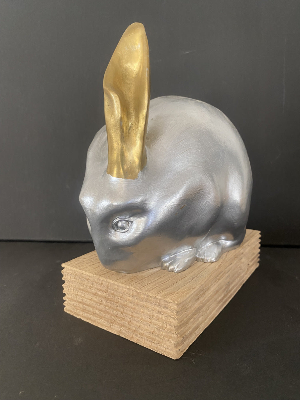 Animal figure-bronze figure-bronze rabbit on oak base with artist signature