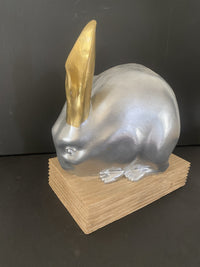 Animal figure-bronze figure-bronze rabbit on oak base with artist signature