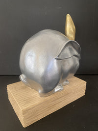 Animal figure-bronze figure-bronze rabbit on oak base with artist signature