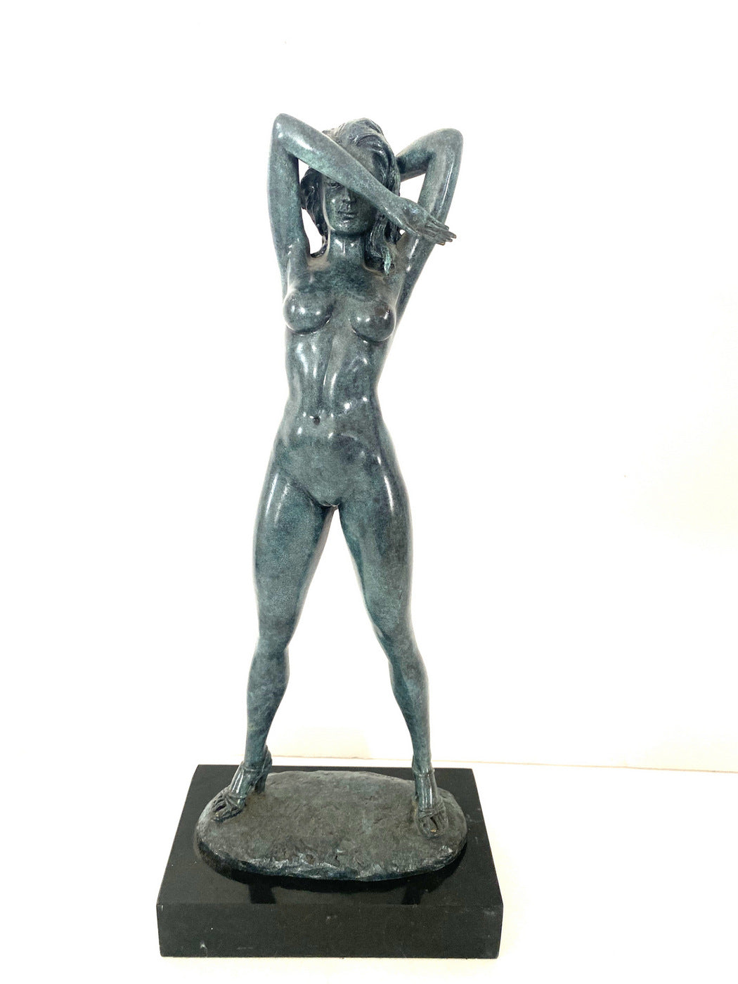 Stylish bronze nude by Raymondo with artist signature