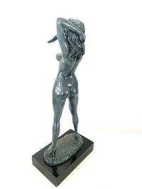 Stylish bronze nude by Raymondo with artist signature