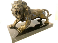 Animal bronze - lion on marble base with artist signature