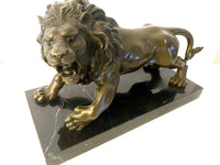 Animal bronze - lion on marble base with artist signature