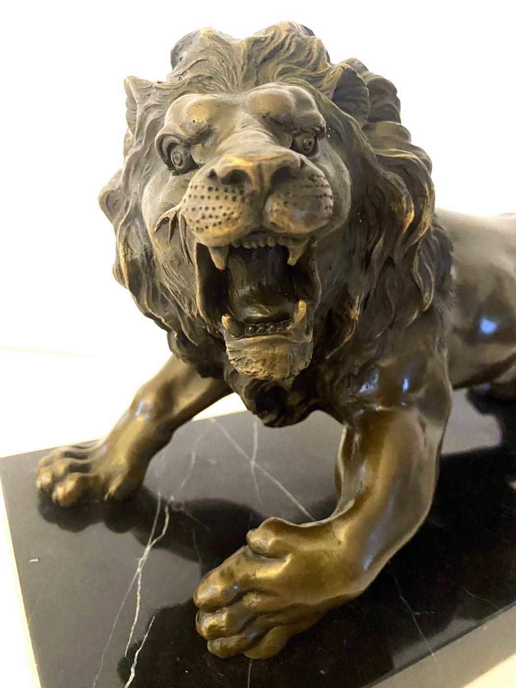 Animal bronze - lion on marble base with artist signature