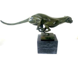 Bronze big cat sprinting on marble base with artist signature