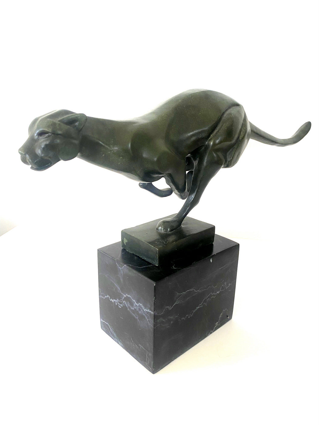 Bronze big cat sprinting on marble base with artist signature