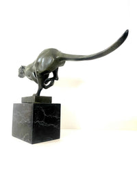 Bronze big cat sprinting on marble base with artist signature