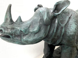 Large animal bronze rhinoceros on marble base with artist signature