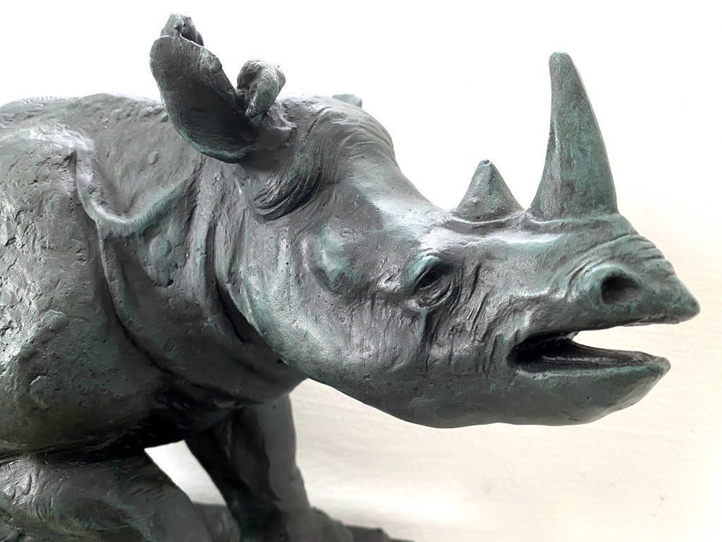 Large animal bronze rhinoceros on marble base with artist signature