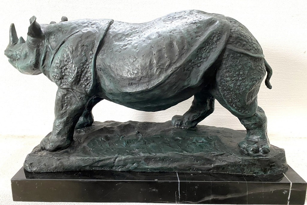 Large animal bronze rhinoceros on marble base with artist signature