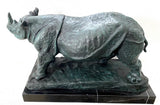 Large animal bronze rhinoceros on marble base with artist signature