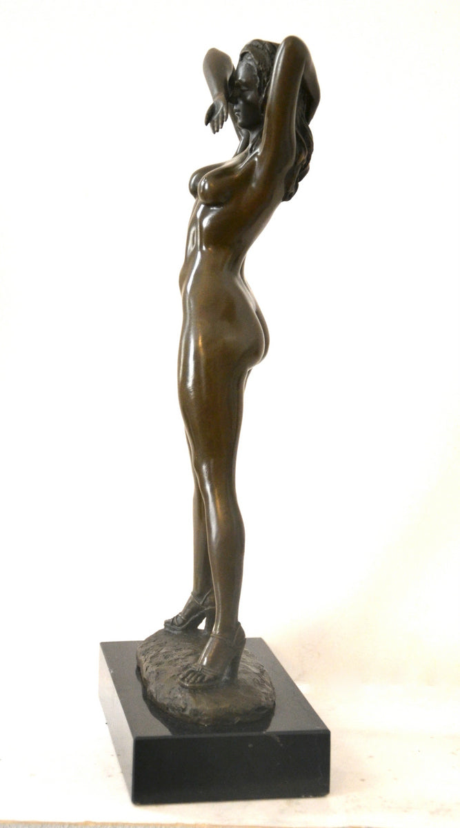 Stylish bronze nude by Raymondo with artist signature