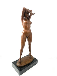 Stylish bronze nude by Raymondo with artist signature